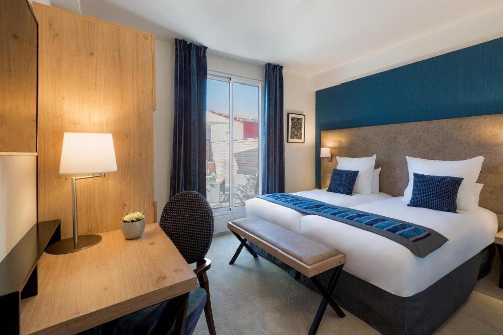 Foto de una habitación de Hôtel Le Rive Droite &amp;amp; SPA