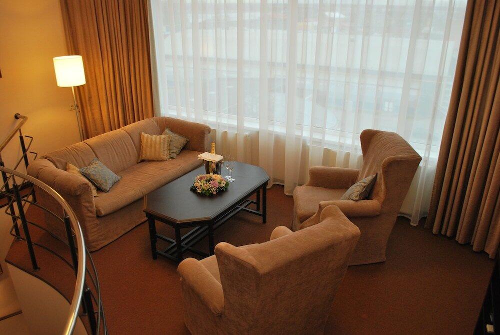 Foto de una habitación de Amrita Hotel