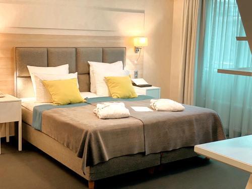 Foto de una habitación de Amrita Hotel