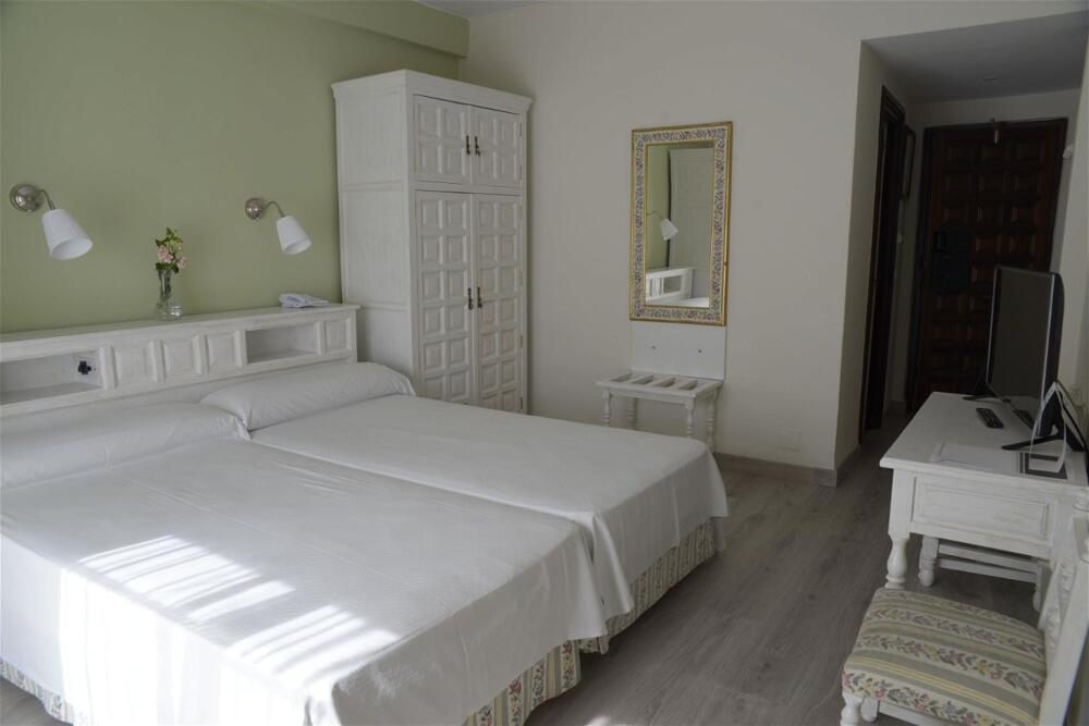 Foto de una habitación de Hotel TRH Mijas