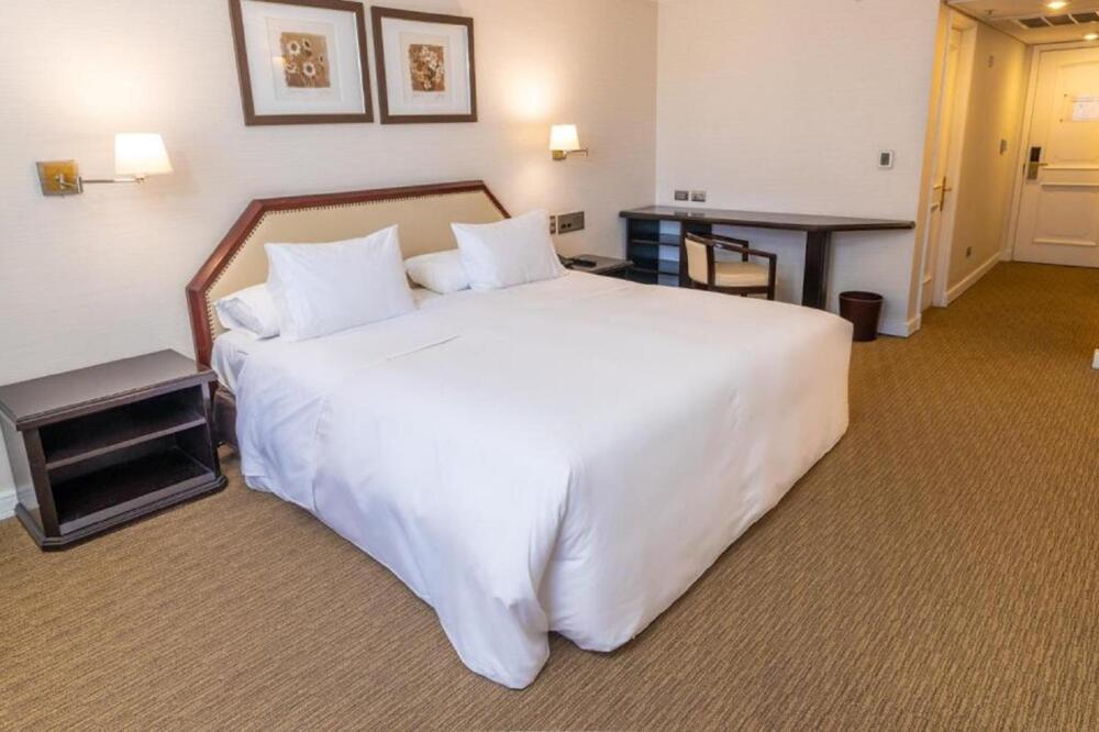 Foto de una habitación de Hotel Wyndham Garden Santiago Kennedy