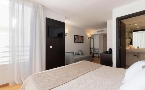 Foto de una habitación de Hotel Palia Sa Coma Playa