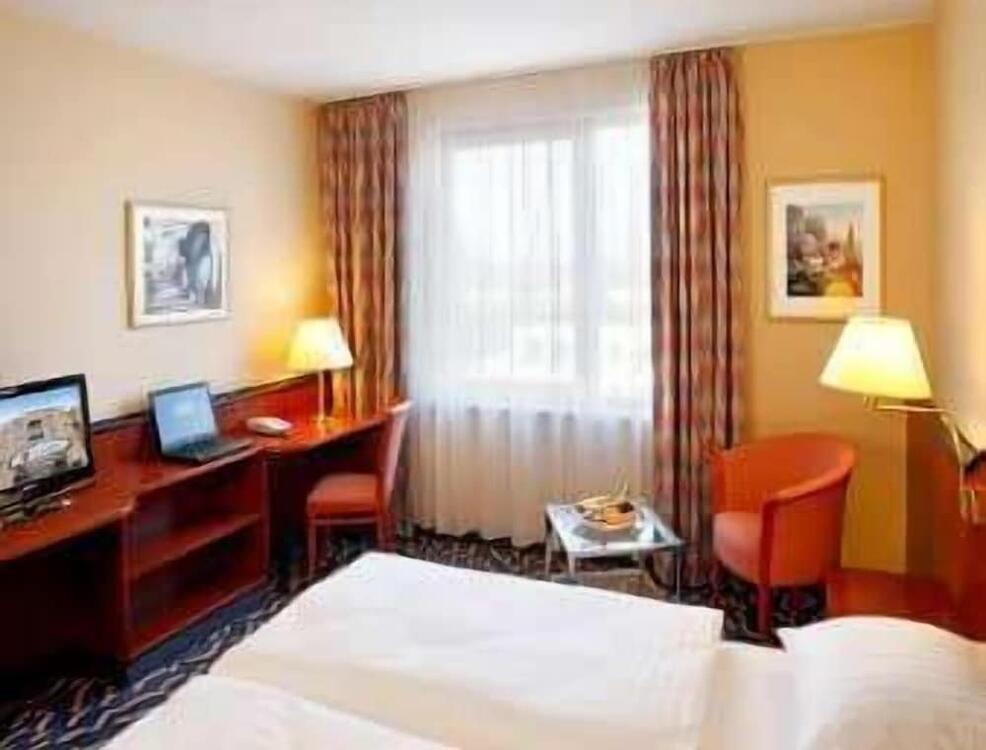 Foto de una habitación de H+ Hotel Hannover