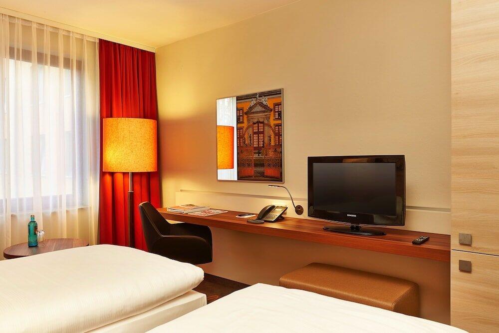 Foto de una habitación de H+ Hotel Hannover
