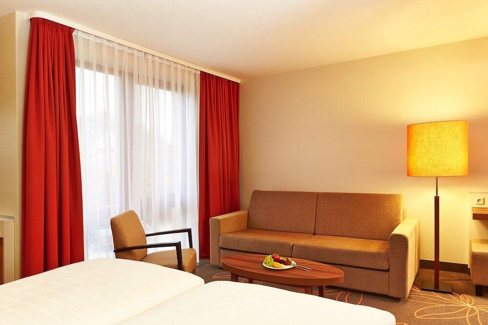 Foto de una habitación de H+ Hotel Hannover
