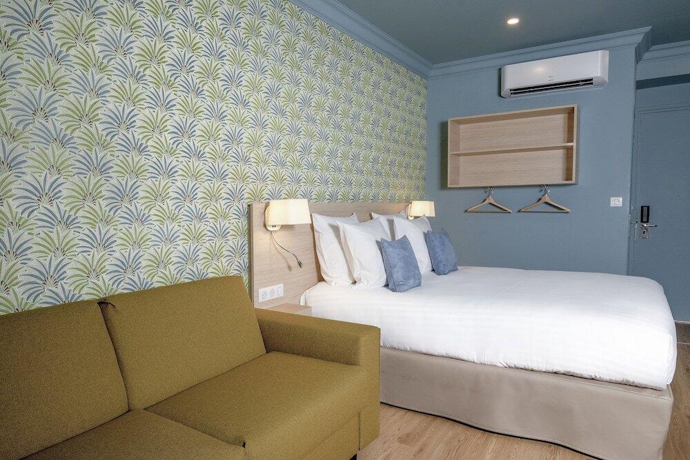 Foto de una habitación de Hôtel Du Centre