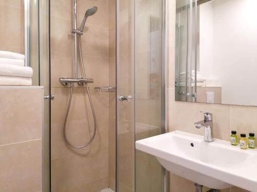 Foto del baño de Hôtel Du Centre