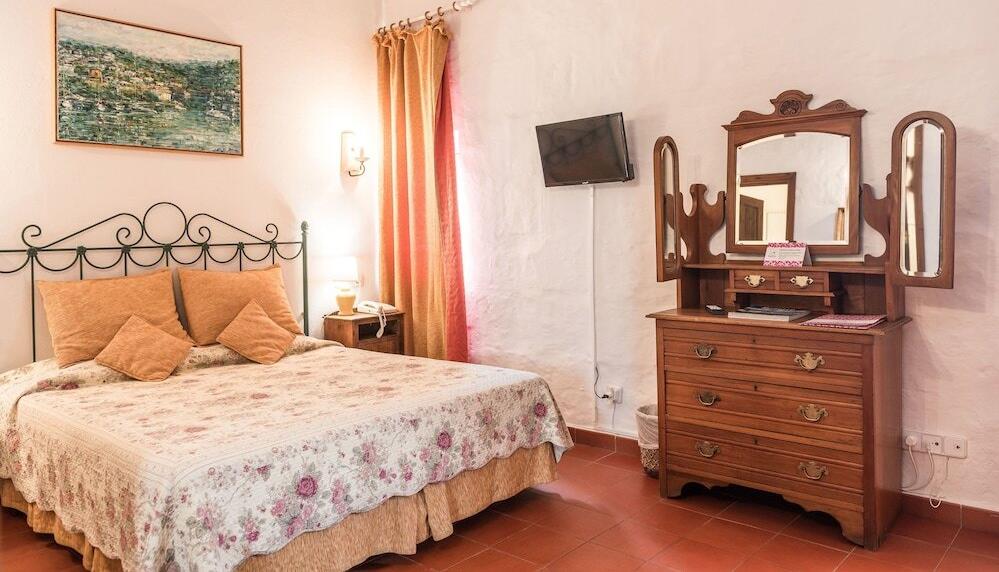 Foto de una habitación de Hotel Rural Biniarroca - Adults Only