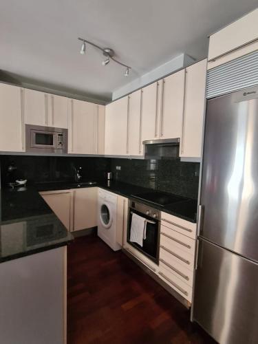 Foto de una habitación de Dos Torres Arwen - Moderno apartamento con wifi gratis cerca del Tubo y con vistas a la Basílica del Pilar ideal para parejas y para el turismo