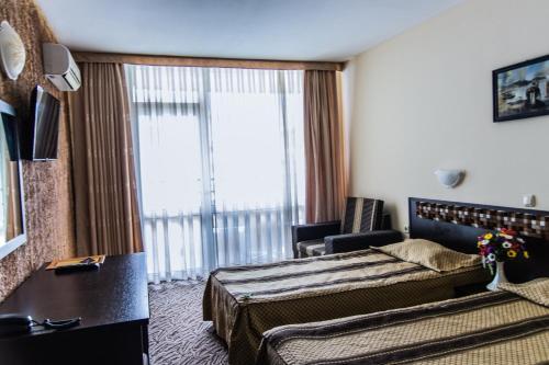 Foto de una habitación de Amaris Hotel