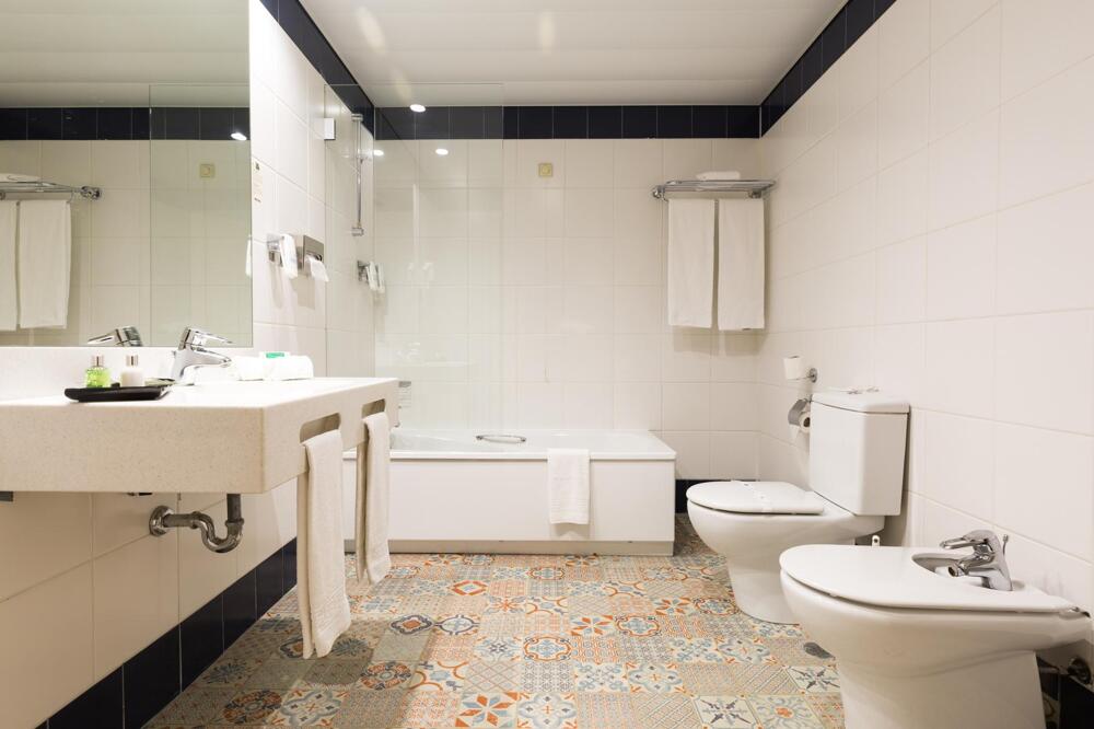 Foto del baño de Legendary Porto Hotel