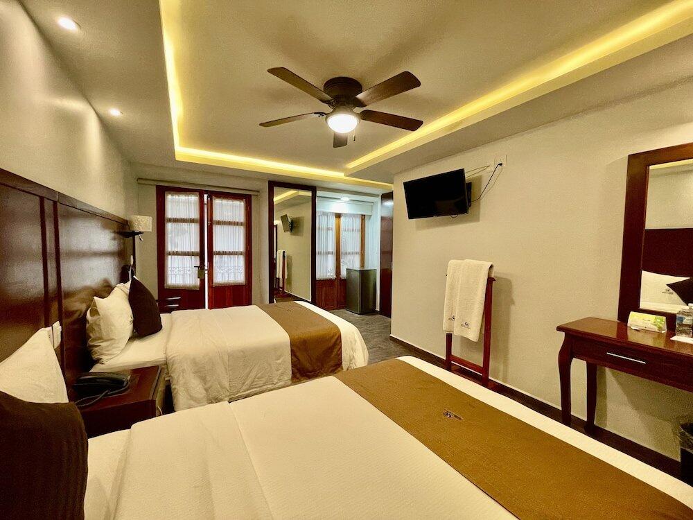Foto de una habitación de Hotel Puebla Plaza