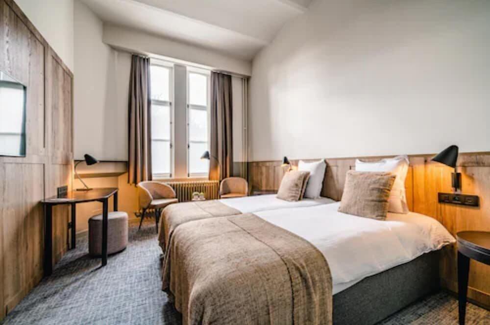 Foto de una habitación de Hotel Monasterium PoortAckere