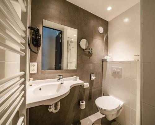 Foto del baño de Hotel Monasterium PoortAckere