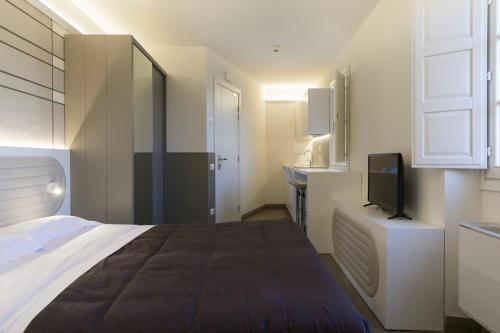 Room – Aparthotel Palazzo dei Ciompi Suites