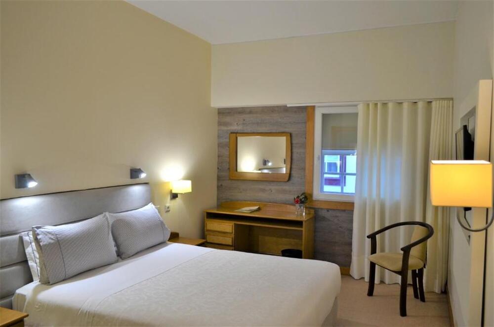 Foto de una habitación de Hotel Toural