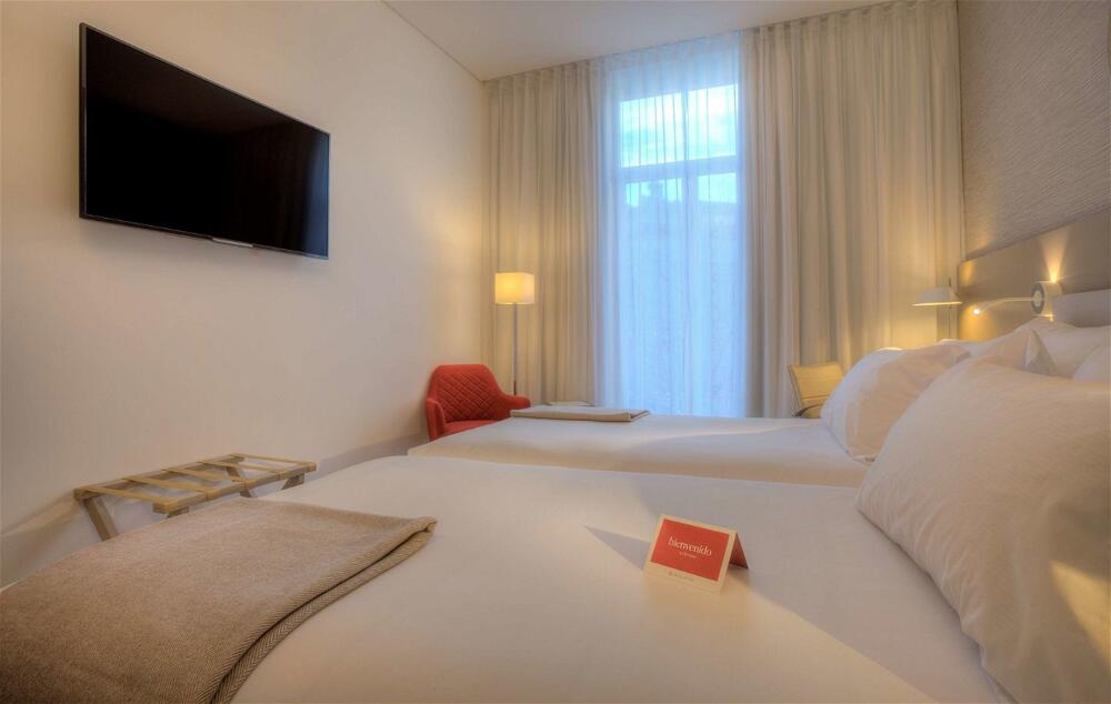 Foto de una habitación de Hotel NH Collection Porto Batalha