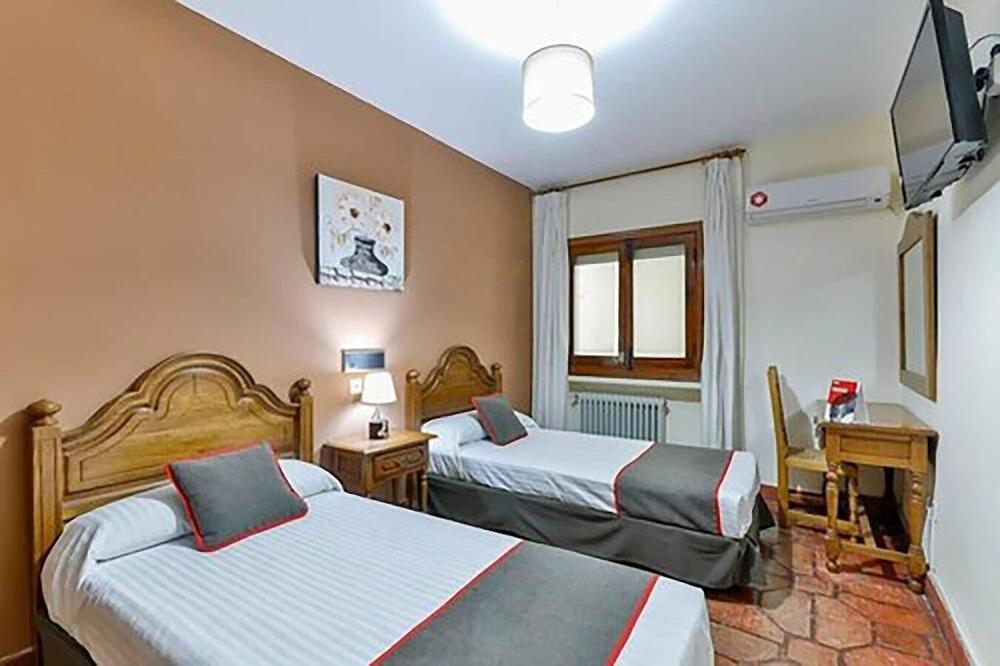 Foto de una habitación de Hostal Alfonso XI
