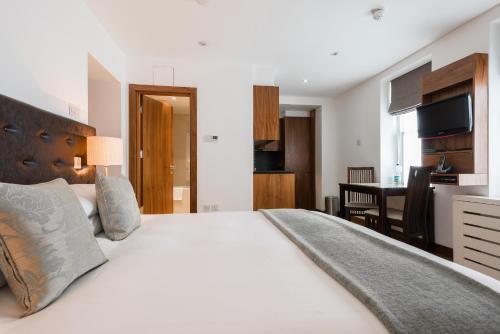 Foto de una habitación de Presidential Apartments Kensington