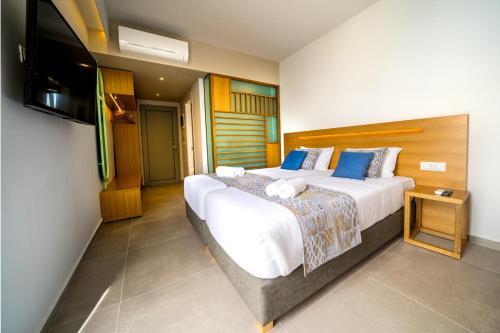 Foto de una habitación de Adele Beach Hotel