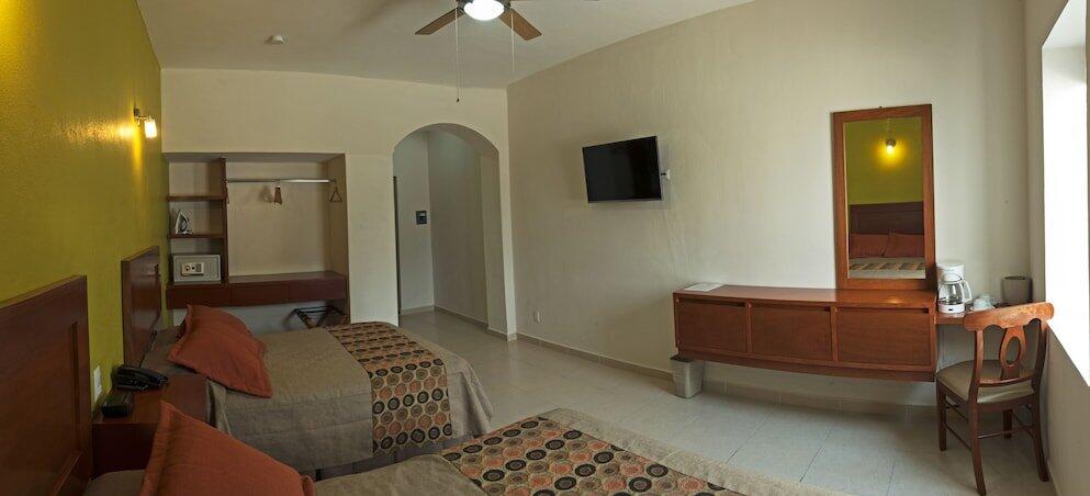 Foto de una habitación de Concierge Plaza La Villa