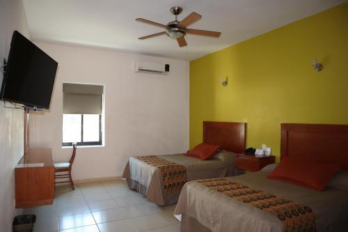Foto de una habitación de Concierge Plaza La Villa