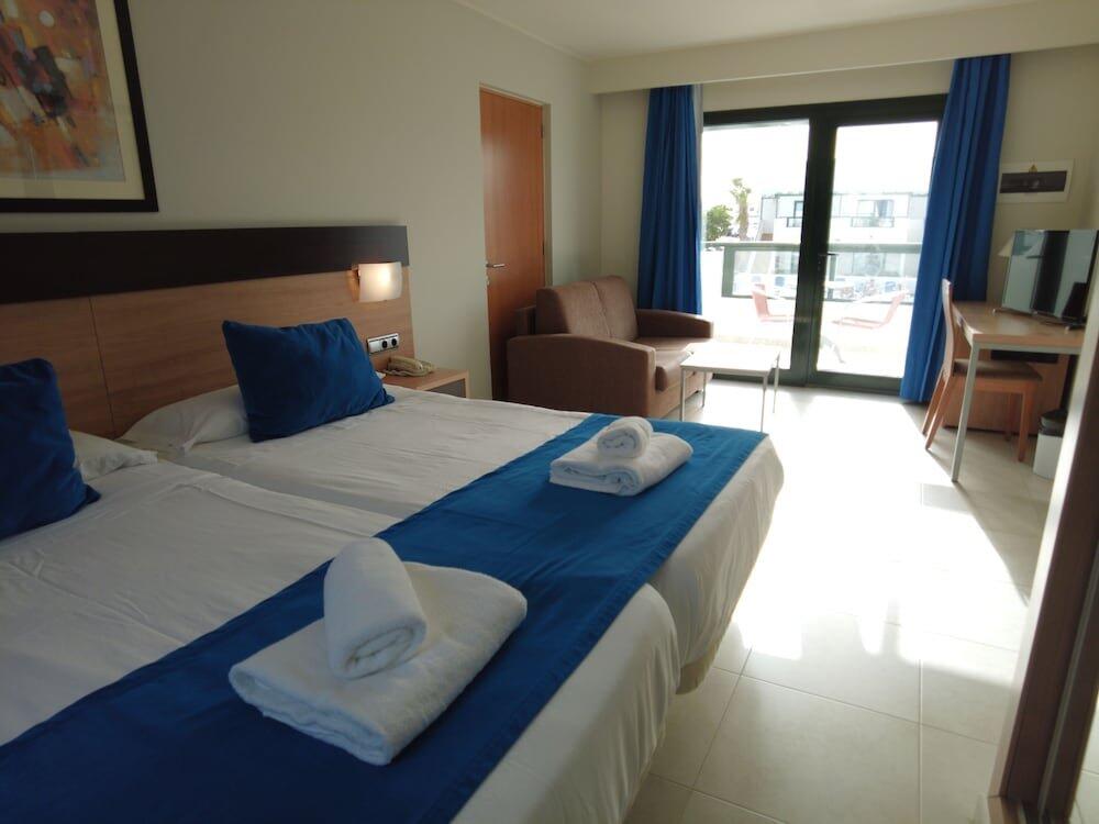 Foto de una habitación de Hotel Pocillos Playa