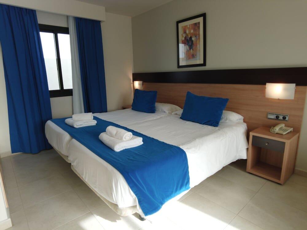 Foto de una habitación de Hotel Pocillos Playa