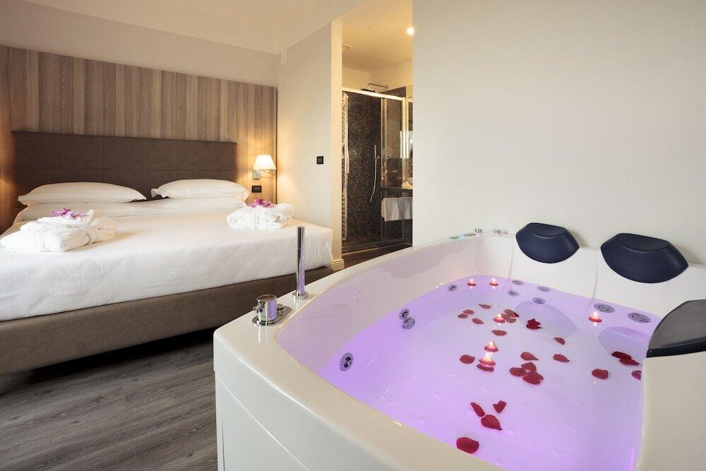 Foto de una habitación de Hotel Garden Experience