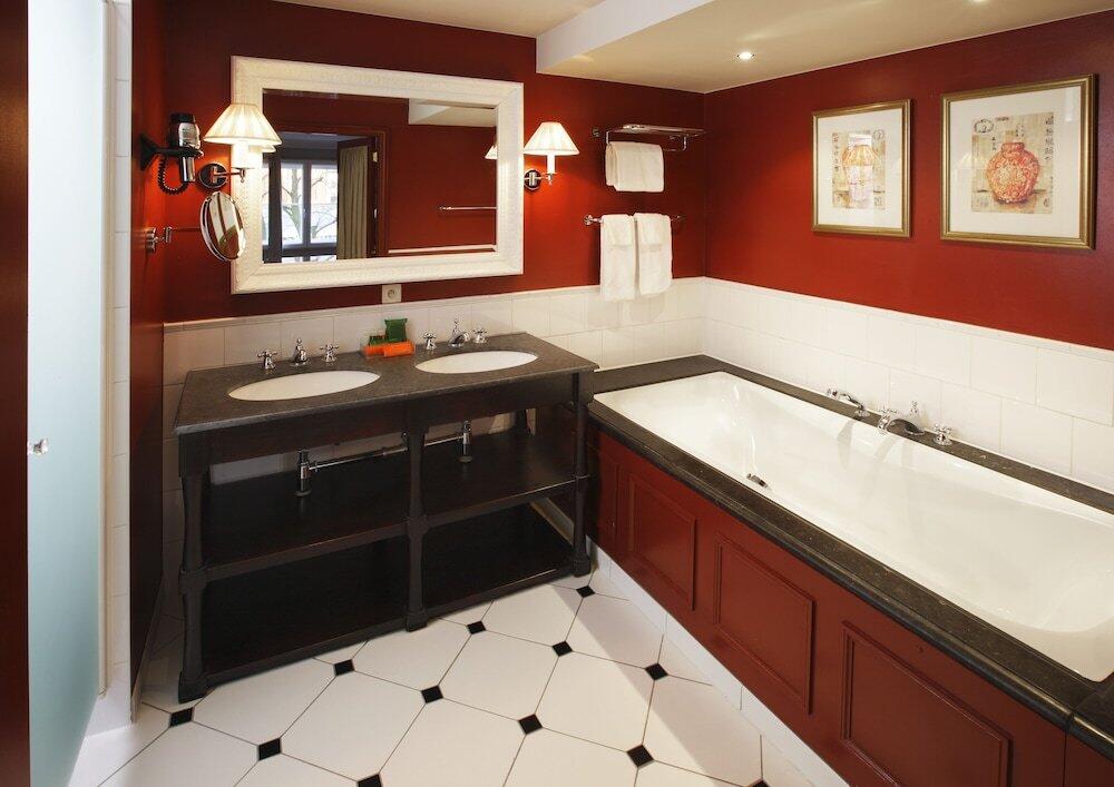 Foto del baño de Hotel NH Brugge