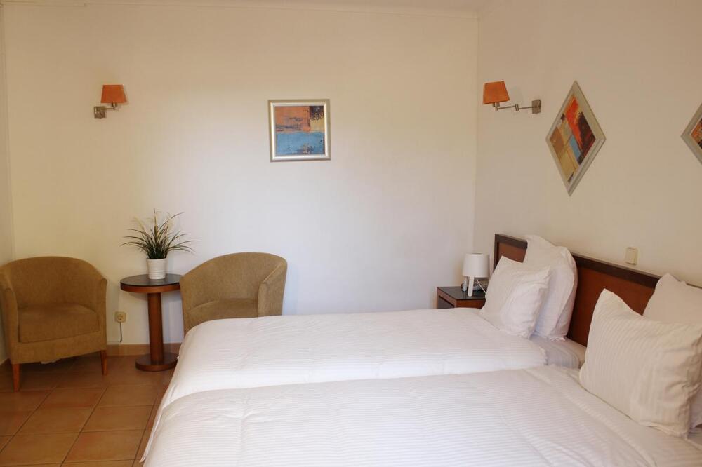 Foto de una habitación de Hotel Pinhal do Sol