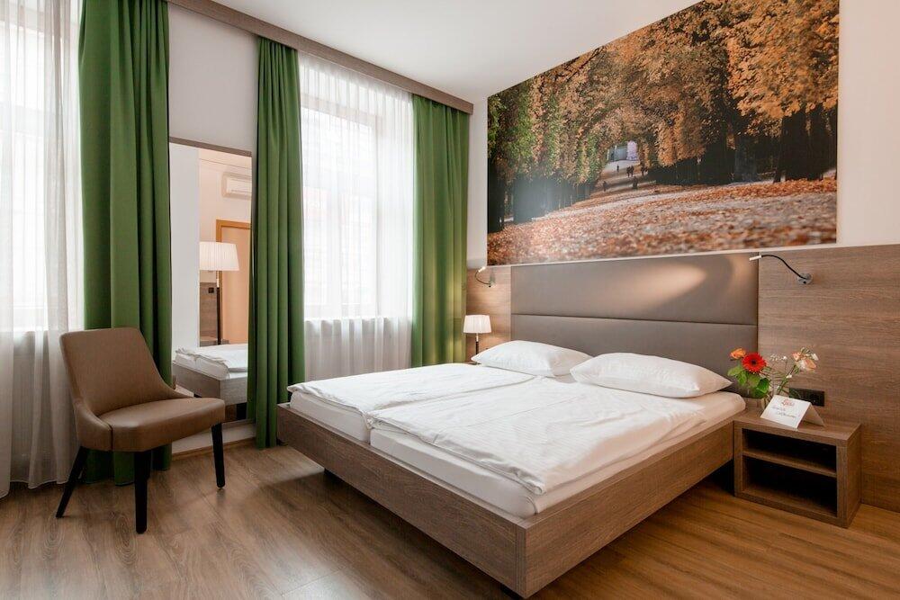 Foto de una habitación de Hotel Lucia