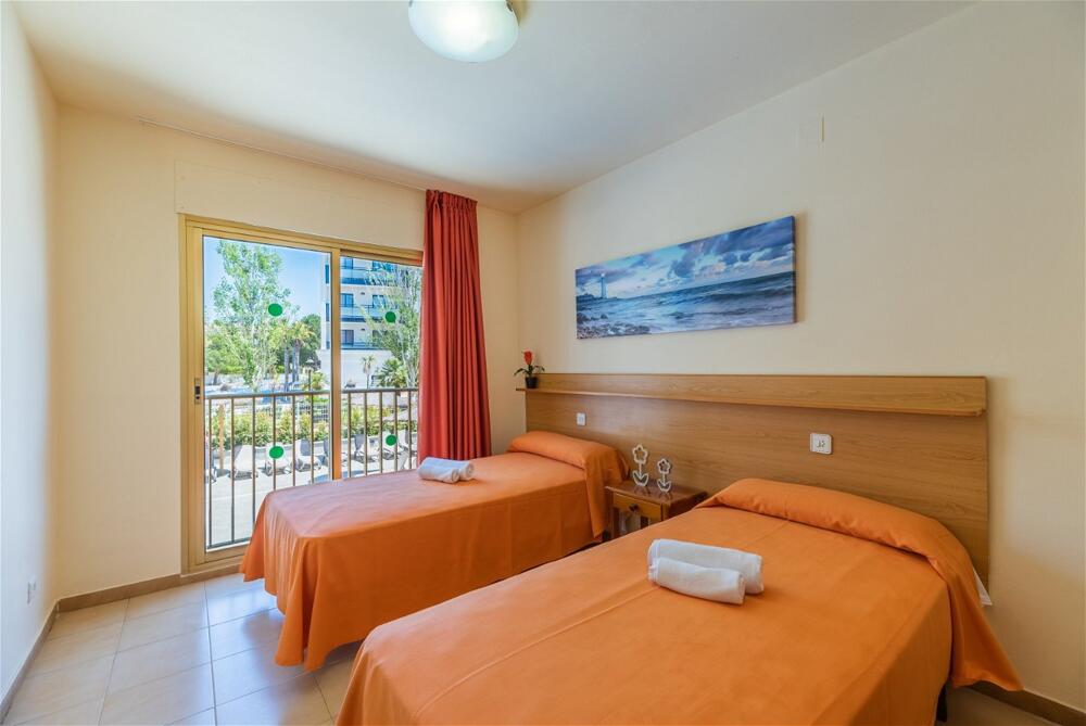 Foto de una habitación de Apartamentos Rentalmar Pins Marina
