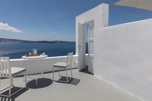 Foto de una habitación de Canaves Oia Boutique Hotel
