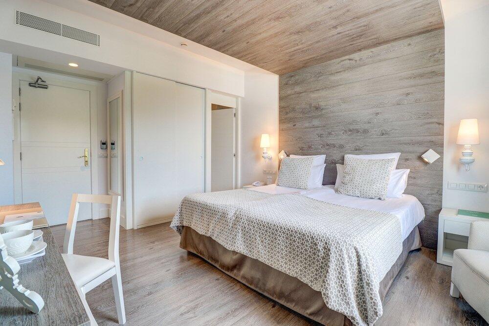 Foto de una habitación de Hotel Illa d&amp;#039;Or &amp;amp; Club Apts 4* Sup