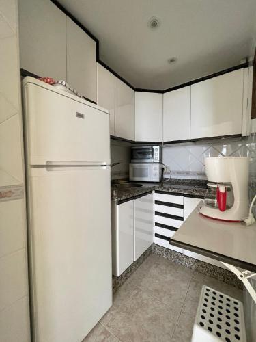 Foto de una habitación de Apartamentos La Roca Rentals