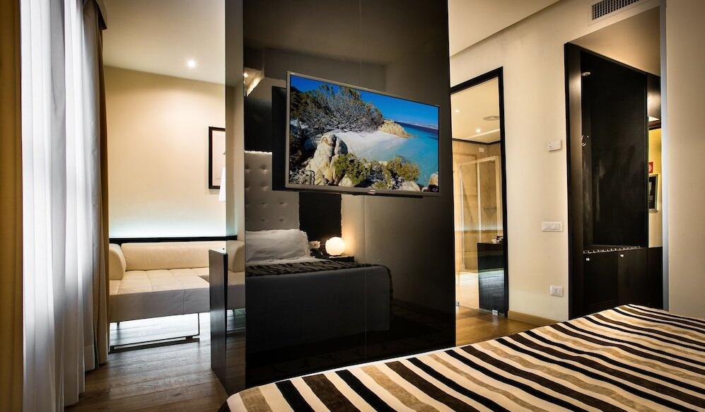 Foto de una habitación de Sardegna Hotel - Suites &amp;amp; Restaurant