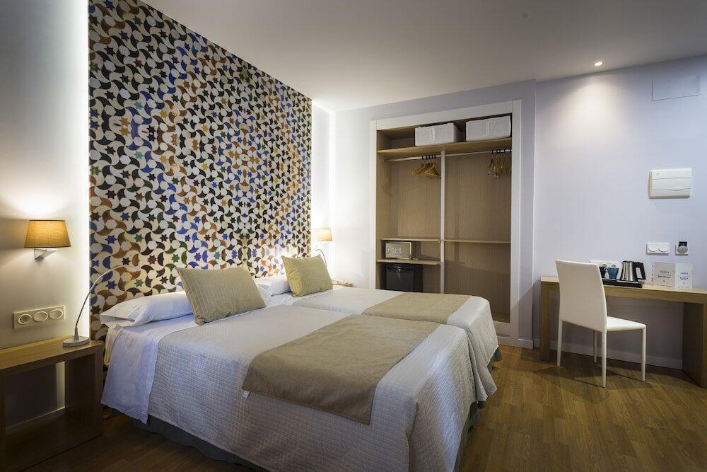 Foto de una habitación de Hotel Comfort Dauro 2