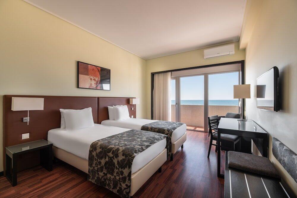 Foto de una habitación de Praiagolfe Hotel