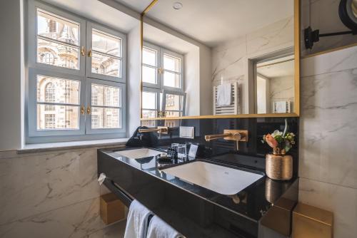 Foto del baño de Hotel Suitess
