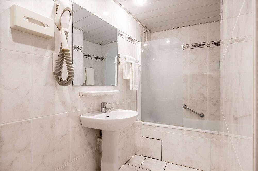 Foto del baño de Quality Hotel Christina Lourdes