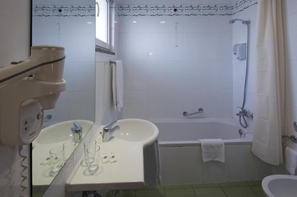 Foto del baño de Hotel Orquidea