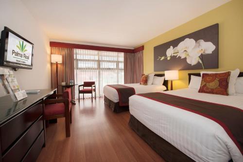 Foto de una habitación de Hotel Palma Real
