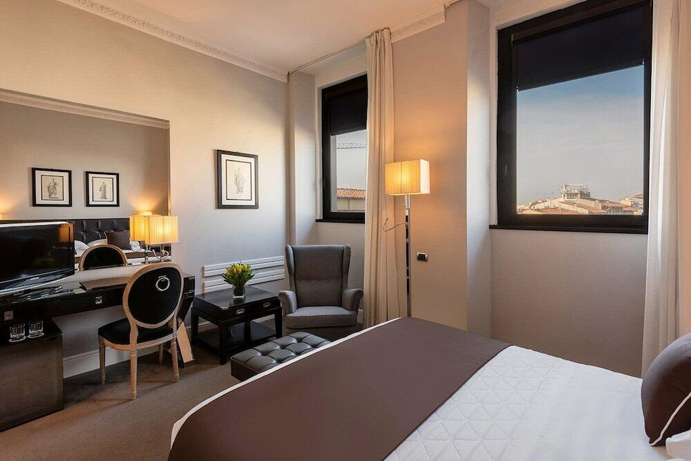 Foto de una habitación de Hotel Roma