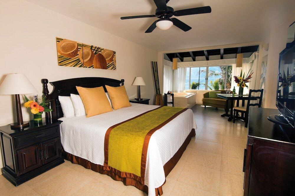Foto de una habitación de Complejo Hidden Beach Resort Au Naturel Adults Only - All Inclusive