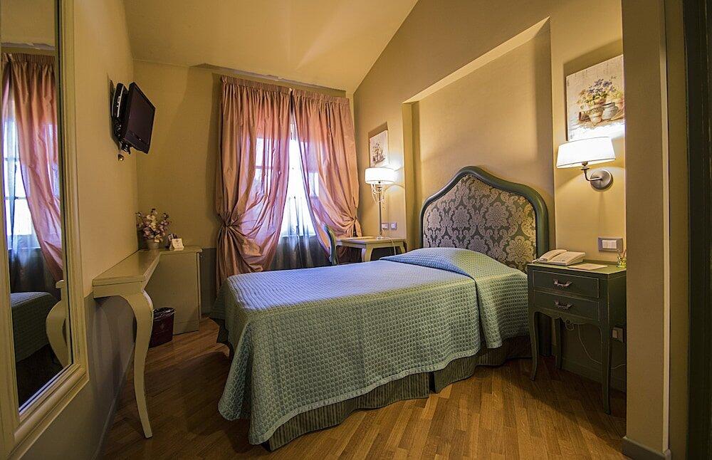 Foto de una habitación de Hotel San Luca Palace