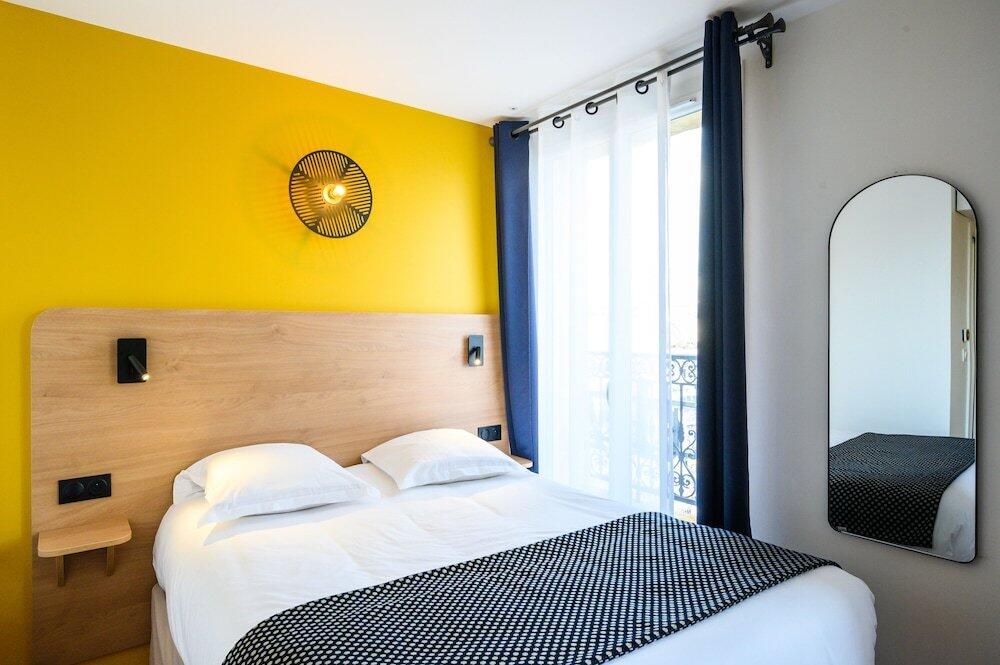 Foto de una habitación de Hôtel d&amp;#039;Alsace