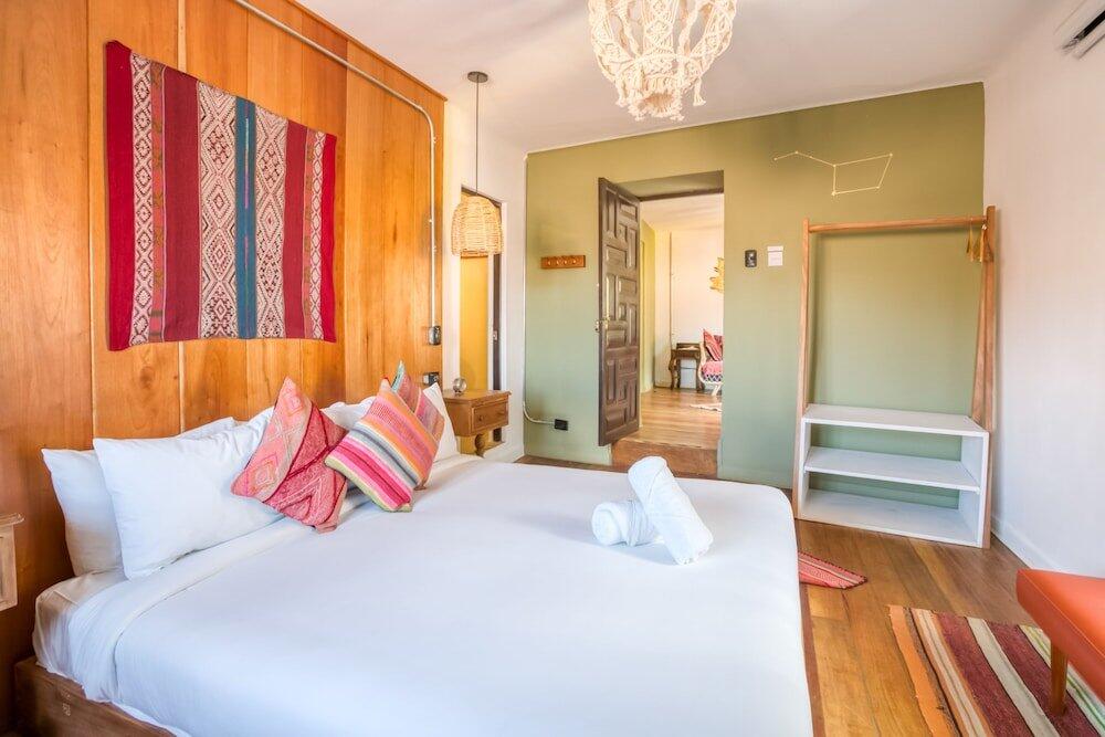 Foto de una habitación de Hotel Selina Saphi Cusco