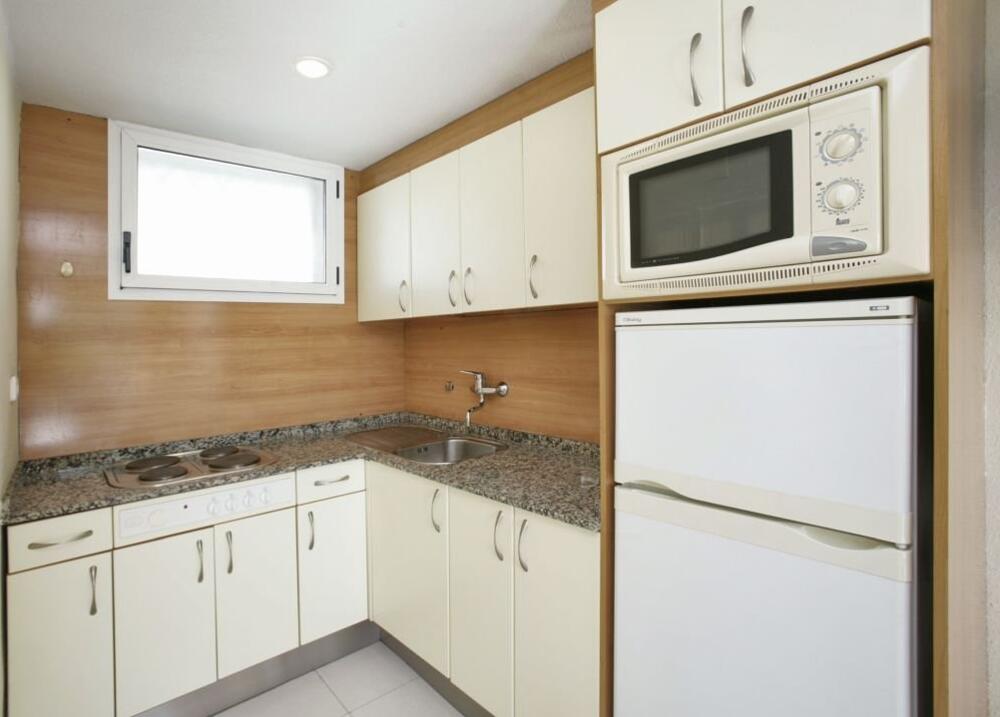 Foto de una habitación de Apartamentos Rentalmar Los Peces