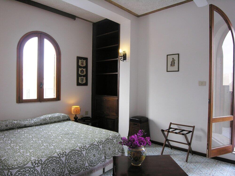 Foto de una habitación de Hotel Carasco